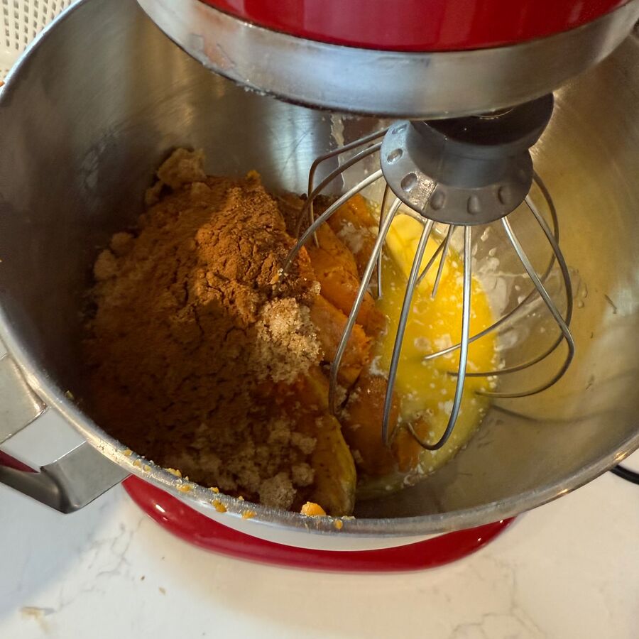 Cream cheese filling with spices in the mixer bowl